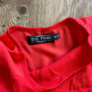 Evil twin top—short in front, long in back size M